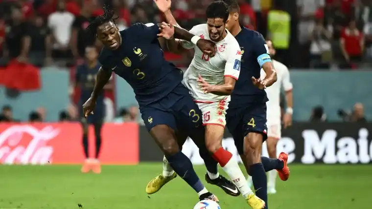 Image - Axel Disasi on the pitch attacking an opponent.