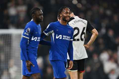 Image - Alex Matos with one of his teammates on the pitch.
