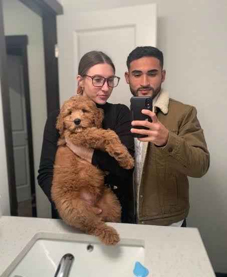 Image - Cristian Roldan with his wife, Ciana Roldan, in a mirror picture with their pet brown dog, Charlie. Image - Cristian Roldan with his wife, Ciana Roldan, in a mirror picture with their pet brown dog, Charlie.
