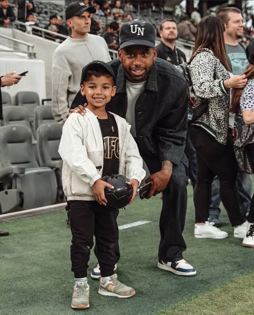 Image - Kellyn Acosta on the pitch with his son, Emerson Acosta. Image - Kellyn Acosta on the pitch with his son, Emerson Acosta.