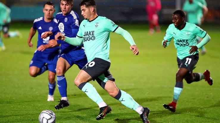 Image - Ruben Rodrigues on the pitch, playing for Notts County against two opponents. Image - Ruben Rodrigues on the pitch, playing for Notts County against two opponents.
